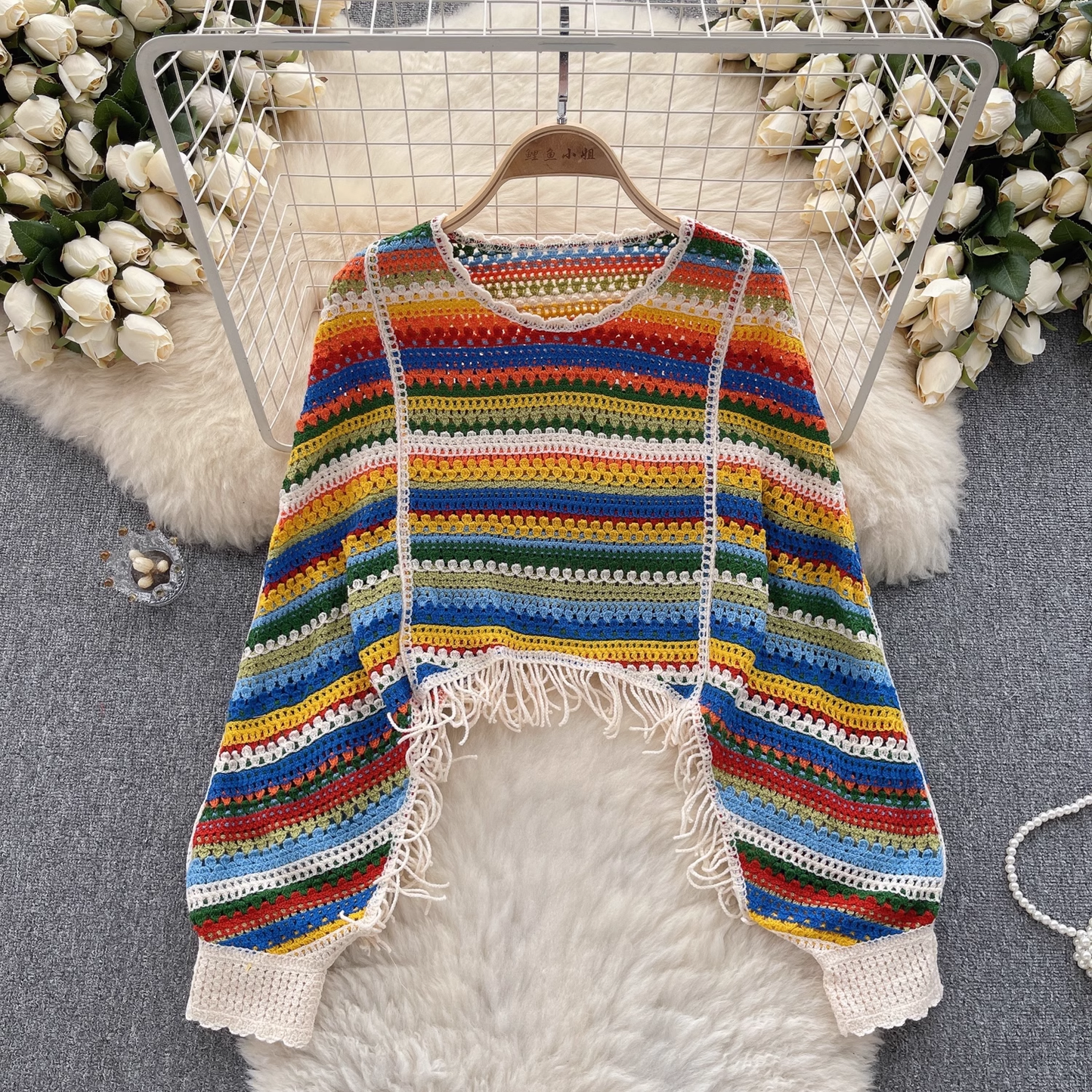 Lazy holiday style color knitted hollow tassel design long-sleeved top for women YM405