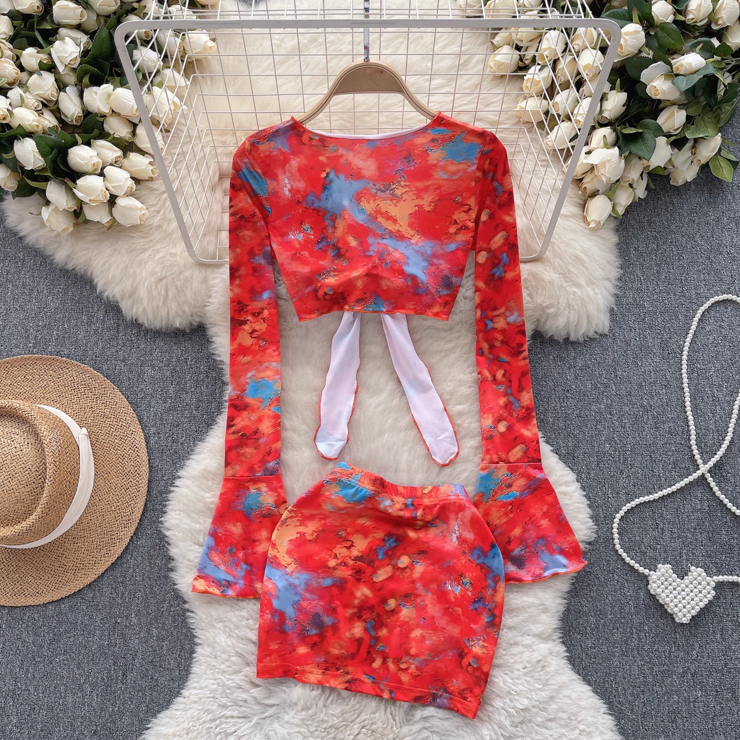 Floral trumpet sleeve top women's short section navel bag hip skirt two-piece suit summer  YM400